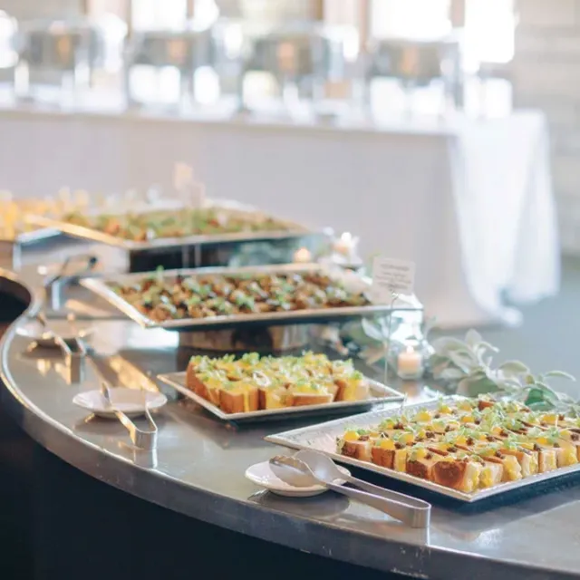 Banquet table with various appetizers displayed ready for the line to start